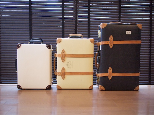 3 Globe-Trotter Suitcases